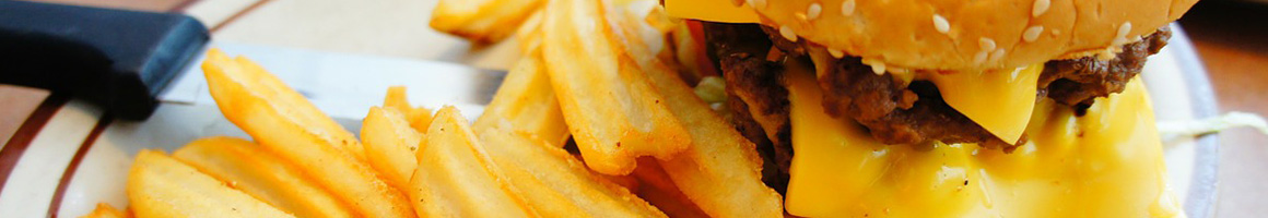 Eating Burger at Kincaid's Hamburgers restaurant in Fort Worth, TX.